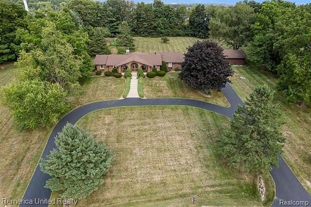2.6 Acres of Land with Home for Sale in Lyon Township, Michigan
