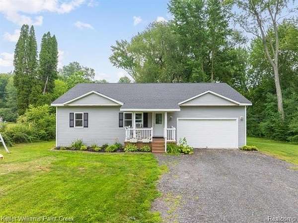 3 Acres of Land with Home for Sale in Wales Township, Michigan