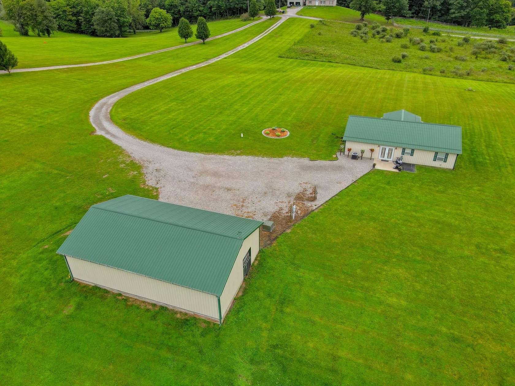 5.26 Acres of Land with Home for Sale in McArthur, Ohio