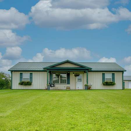 5.26 Acres of Land with Home for Sale in McArthur, Ohio