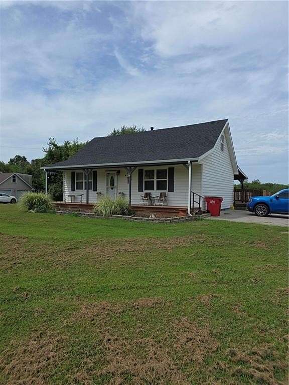 2.5 Acres of Land with Home for Sale in Lone Jack, Missouri