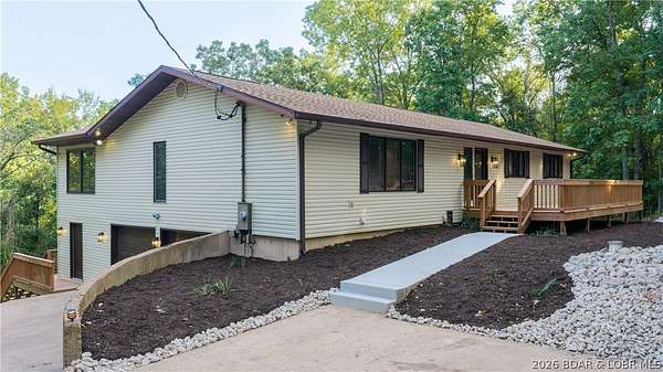 7.18 Acres of Land with Home for Sale in Kaiser, Missouri