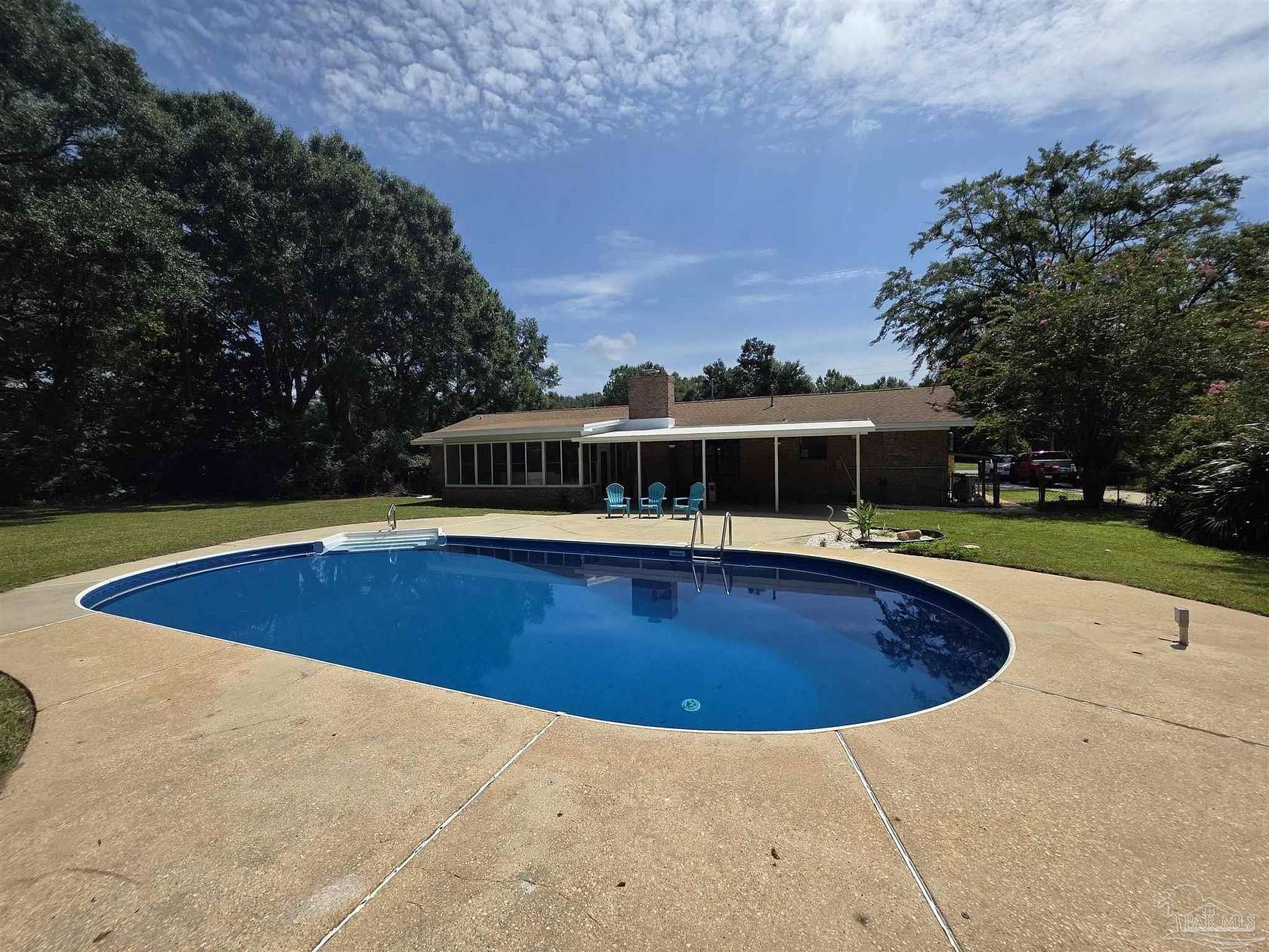 1.5 Acres of Land with Home for Sale in Milton, Florida