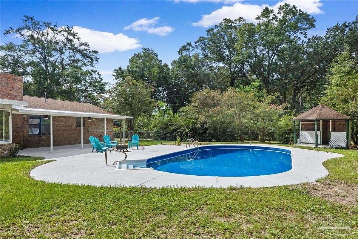 1.5 Acres of Land with Home for Sale in Milton, Florida