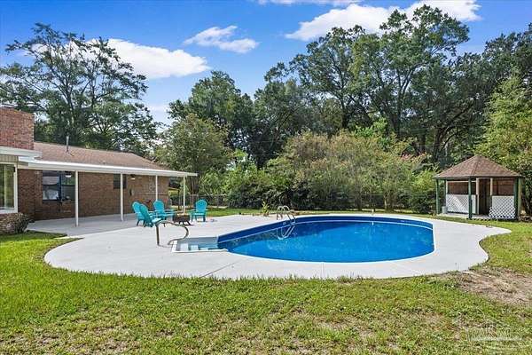 1.5 Acres of Land with Home for Sale in Milton, Florida