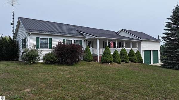 3 Acres of Land with Home for Sale in Remus, Michigan