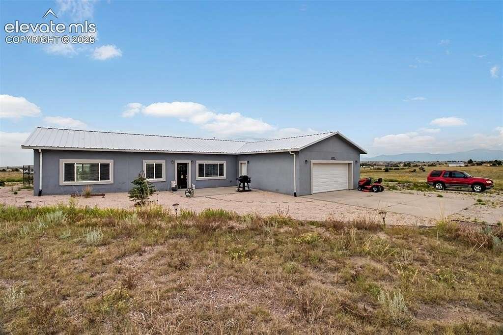 6.42 Acres of Land with Home for Sale in Peyton, Colorado