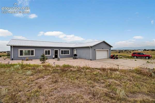 6.42 Acres of Land with Home for Sale in Peyton, Colorado