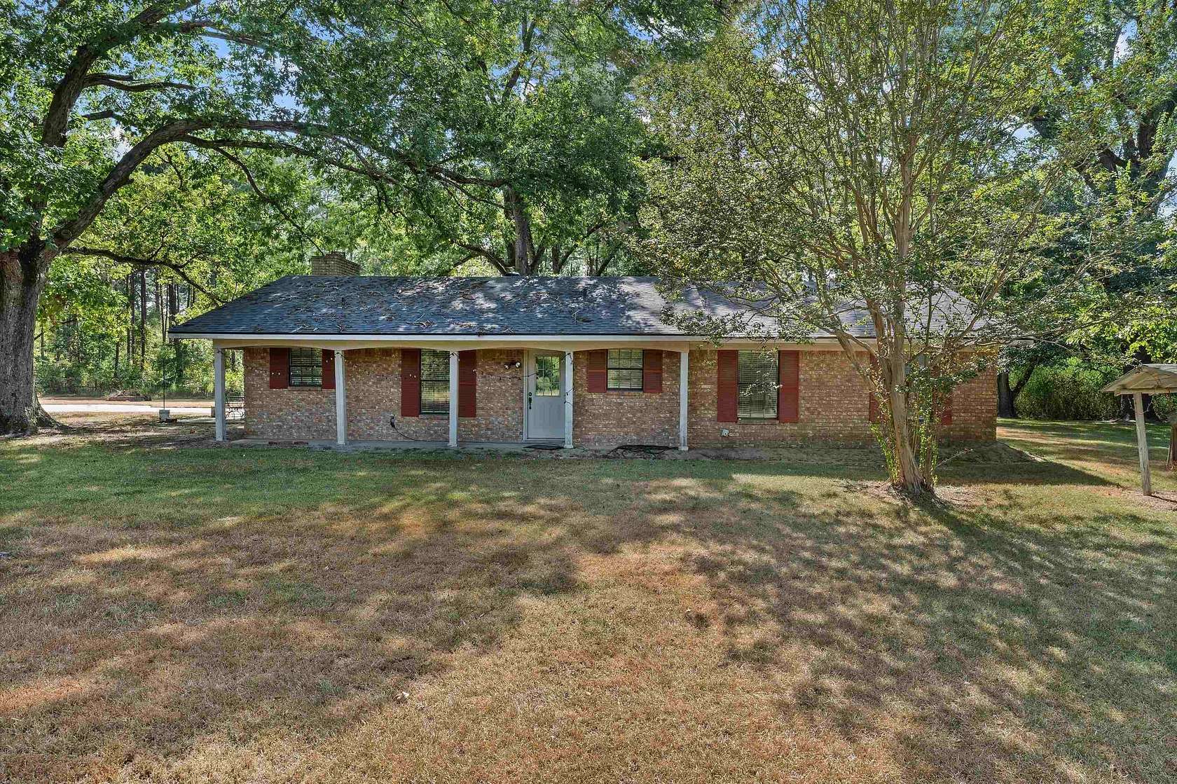 4.2 Acres of Land with Home for Sale in Carthage, Texas