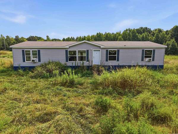 5 Acres of Land with Home for Sale in Romance, Arkansas