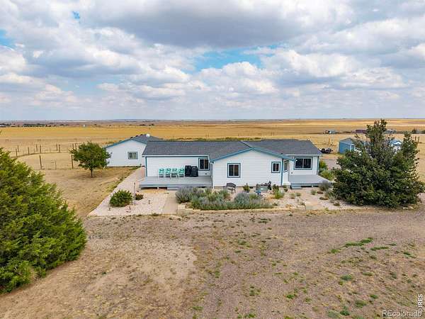 39 Acres of Land with Home for Sale in Keenesburg, Colorado