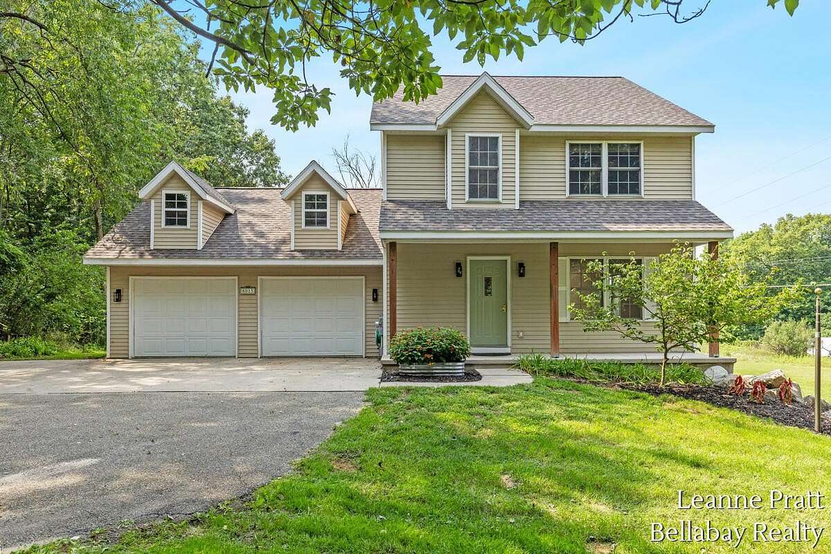 1.6 Acres of Land with Home for Sale in Rockford, Michigan
