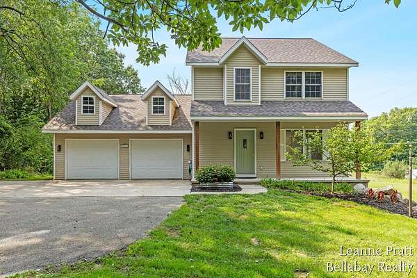 1.6 Acres of Land with Home for Sale in Rockford, Michigan