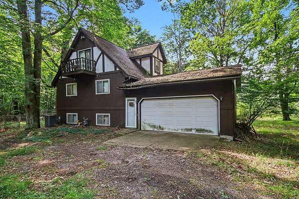 26.7 Acres of Recreational Land with Home for Sale in West Olive, Michigan