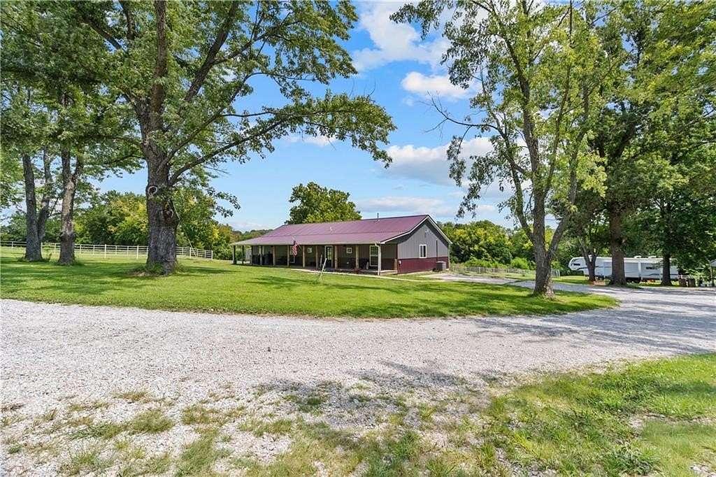 14.2 Acres of Land with Home for Sale in Centerview, Missouri