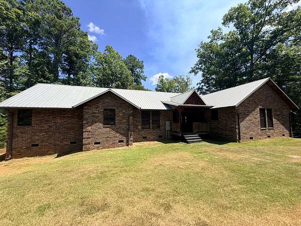 6.52 Acres of Land with Home for Sale in Stephens, Arkansas