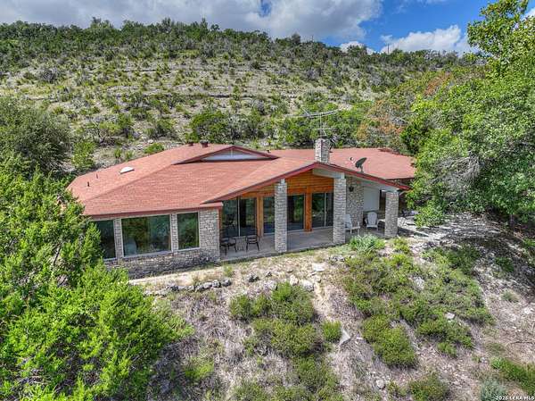 7.73 Acres of Land with Home for Sale in New Braunfels, Texas