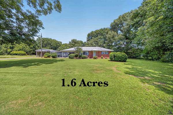 1.63 Acres of Land with Home for Sale in Byron, Georgia