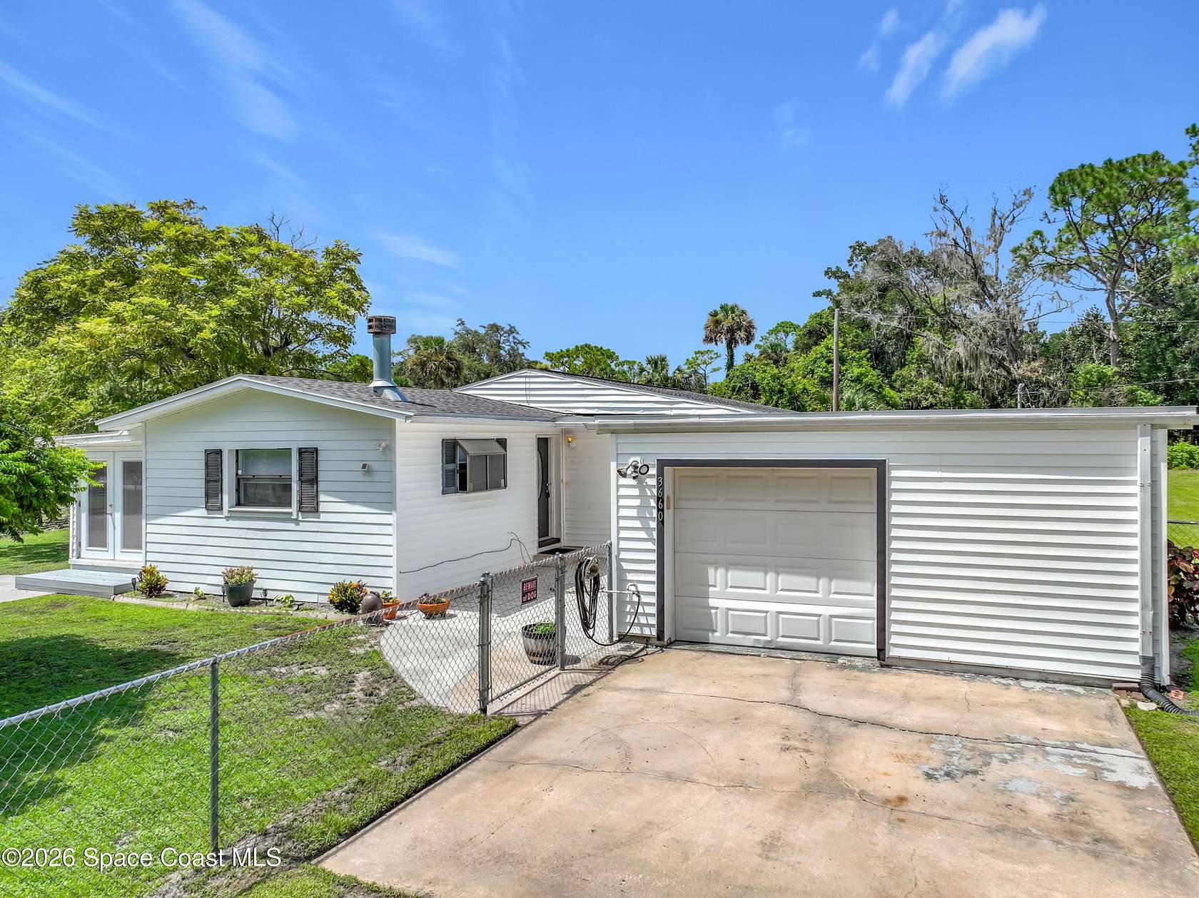 2 Acres of Land with Home for Sale in Mims, Florida