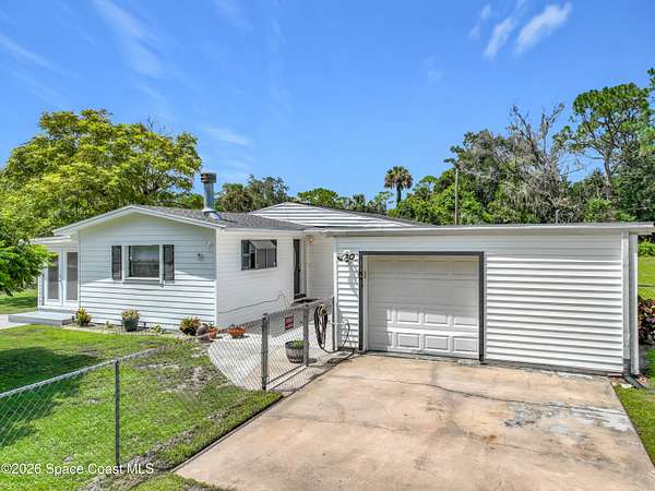2 Acres of Land with Home for Sale in Mims, Florida