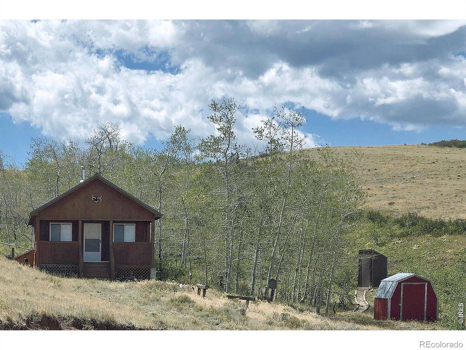 38 Acres of Recreational Land with Home for Sale in Red Feather Lakes, Colorado