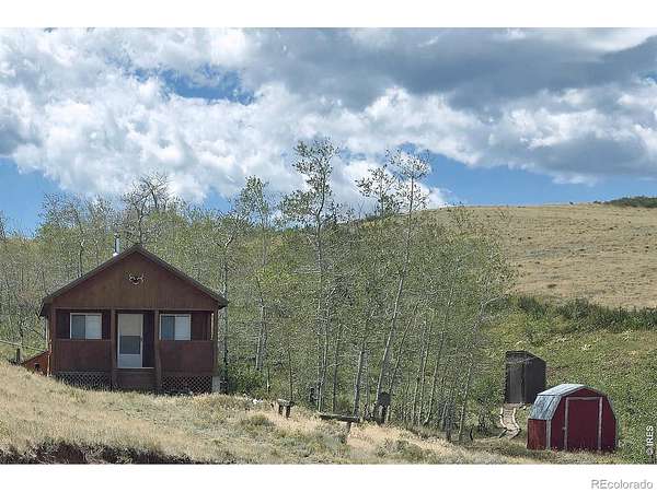 38 Acres of Recreational Land with Home for Sale in Red Feather Lakes, Colorado
