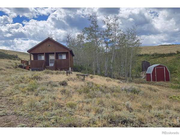 38 Acres of Recreational Land with Home for Sale in Red Feather Lakes, Colorado