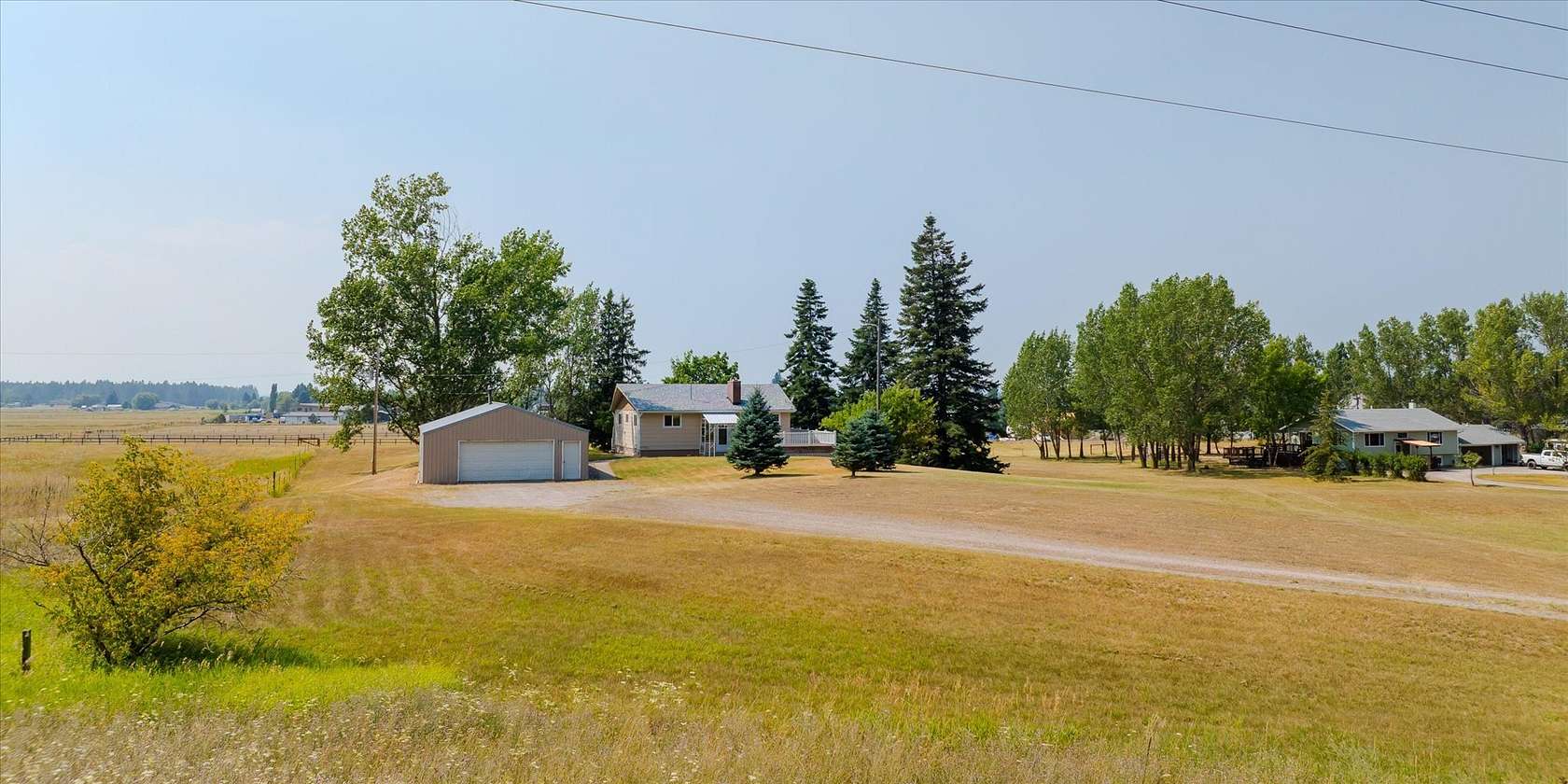 7 Acres of Land with Home for Sale in Columbia Falls, Montana