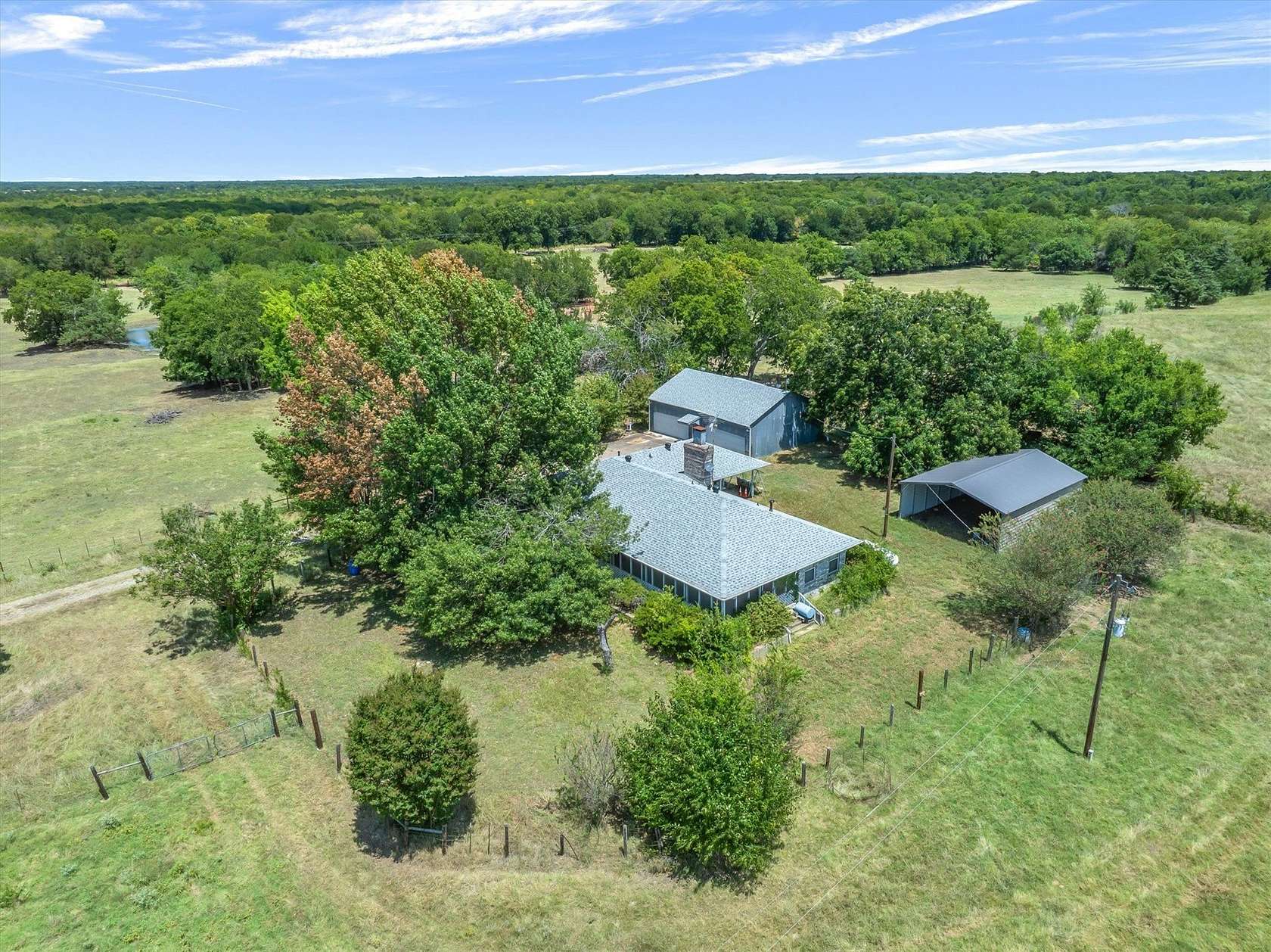 28.4 Acres of Agricultural Land with Home for Sale in Campbell, Texas