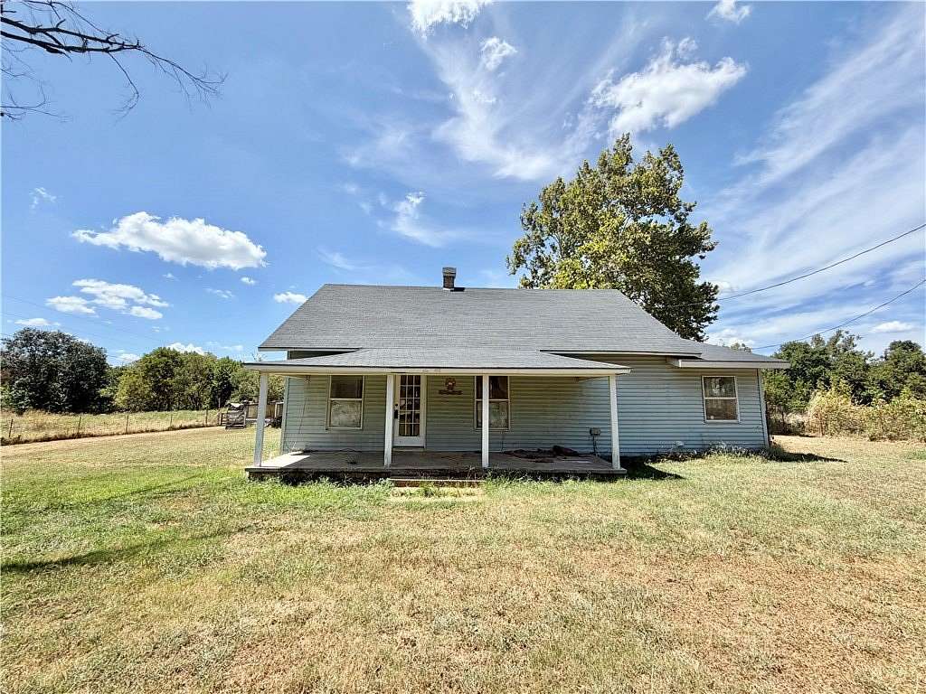 4.5 Acres of Land with Home for Sale in Gentry, Arkansas