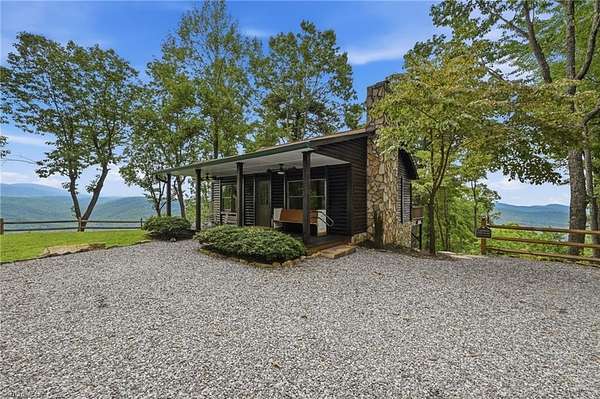 11.6 Acres of Land with Home for Sale in Purlear, North Carolina