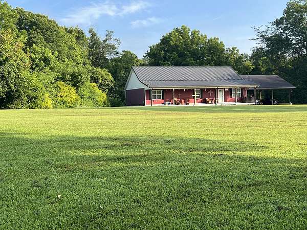 16.3 Acres of Land with Home for Sale in Dickson, Tennessee