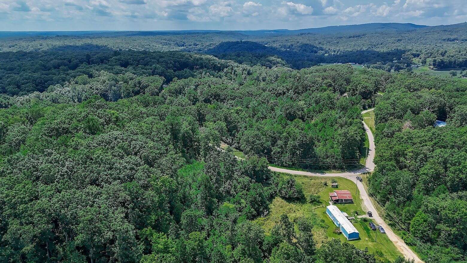 5 Acres of Land with Home for Sale in Spring City, Tennessee