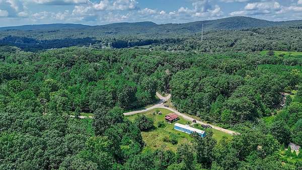 5 Acres of Land with Home for Sale in Spring City, Tennessee