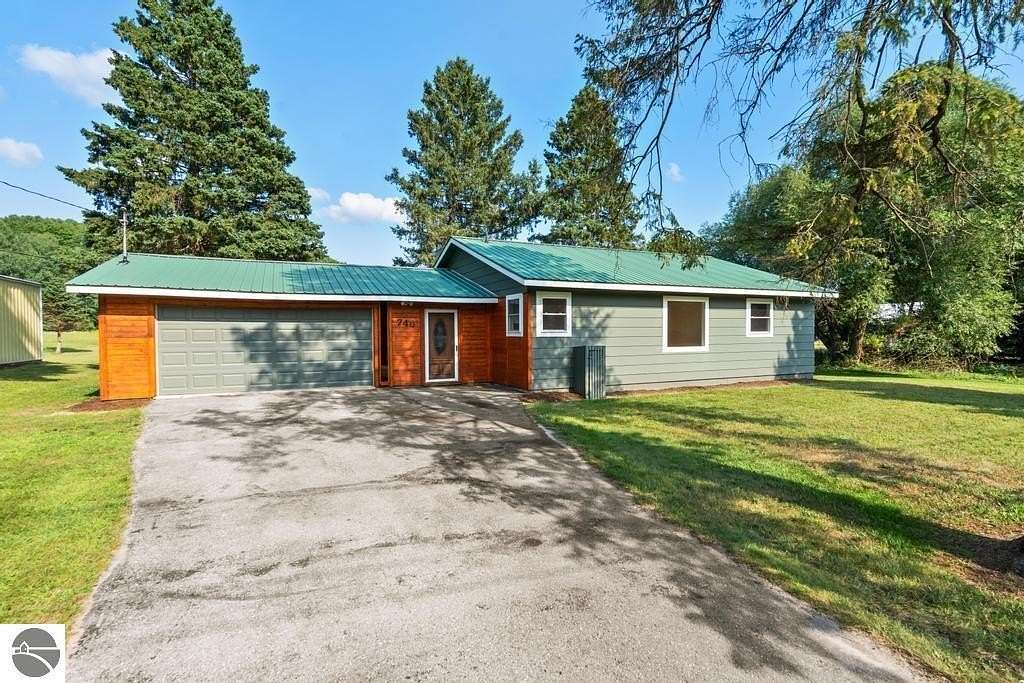 3.8 Acres of Land with Home for Sale in East Jordan, Michigan