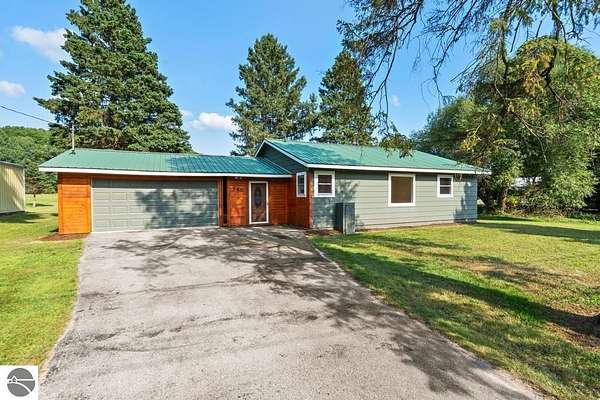 3.8 Acres of Land with Home for Sale in East Jordan, Michigan