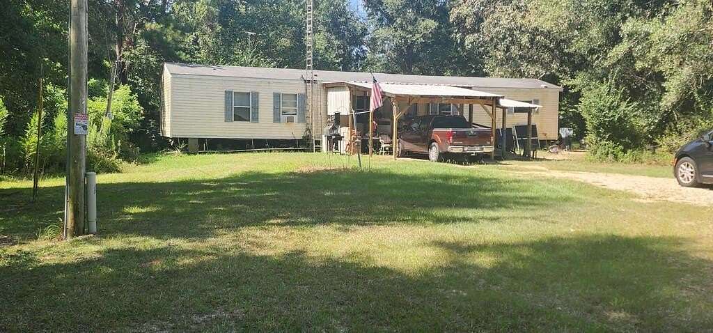 19.6 Acres of Land with Home for Sale in Poplarville, Mississippi