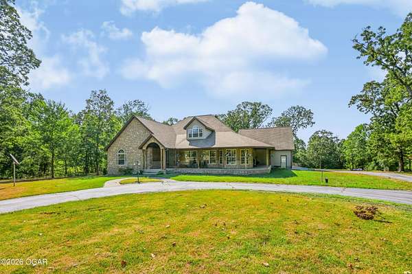 1.88 Acres of Land with Home for Sale in Carthage, Missouri