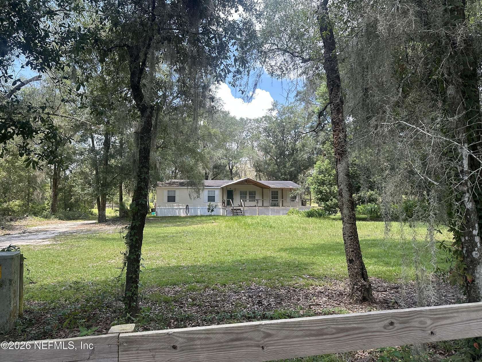 2.66 Acres of Land with Home for Sale in Interlachen, Florida