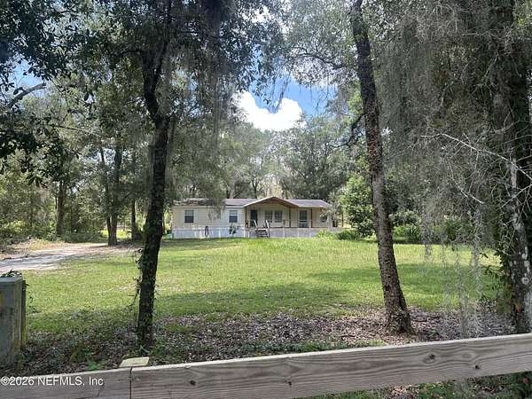 2.66 Acres of Land with Home for Sale in Interlachen, Florida