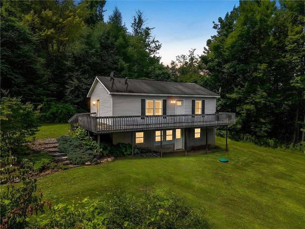 9.76 Acres of Land with Home for Sale in Newfield, New York