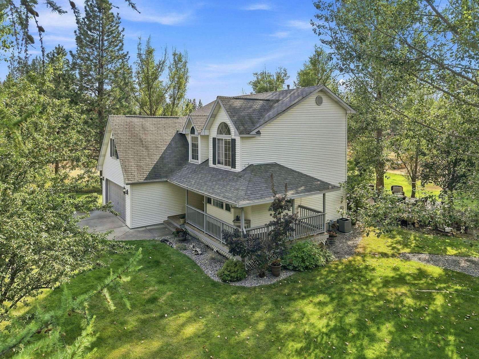 3.72 Acres of Land with Home for Sale in Colbert, Washington