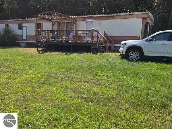 6 Acres of Land with Home for Sale in Central Lake, Michigan