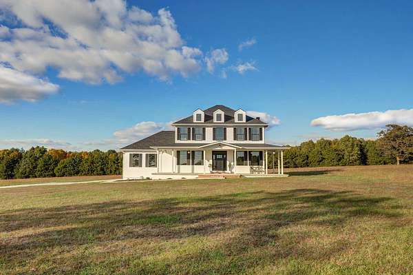 5.87 Acres of Land with Home for Sale in Conway, Missouri
