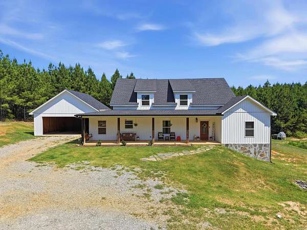 4.58 Acres of Land with Home for Sale in Benton, Arkansas
