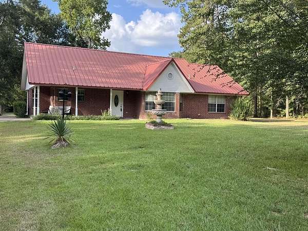 3.72 Acres of Land with Home for Sale in Diboll, Texas