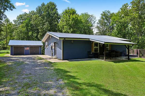 5.1 Acres of Land with Home for Sale in Bradyville, Tennessee