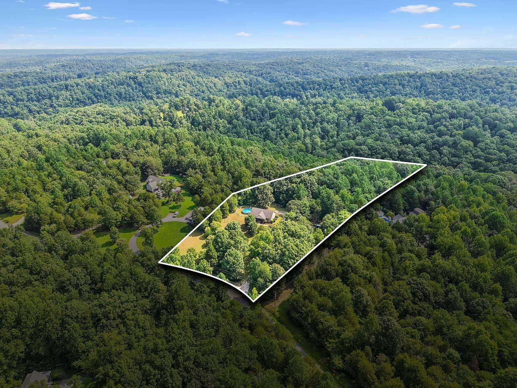 5.7 Acres of Land with Home for Sale in White Bluff, Tennessee