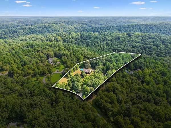 5.7 Acres of Land with Home for Sale in White Bluff, Tennessee
