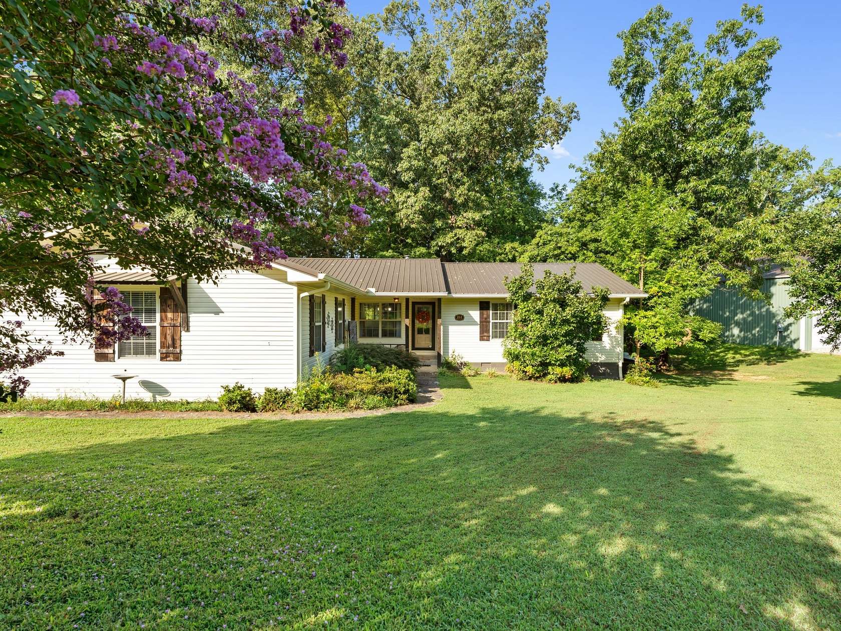 3.67 Acres of Land with Home for Sale in Clifton, Tennessee
